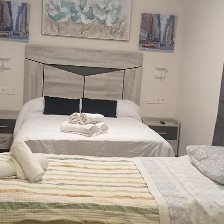 Hostal Restaurante Braseria Muela De San Juan Maison d'hôtes